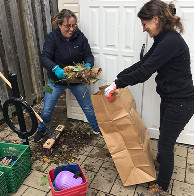 Picture of two volunteer doing gardening