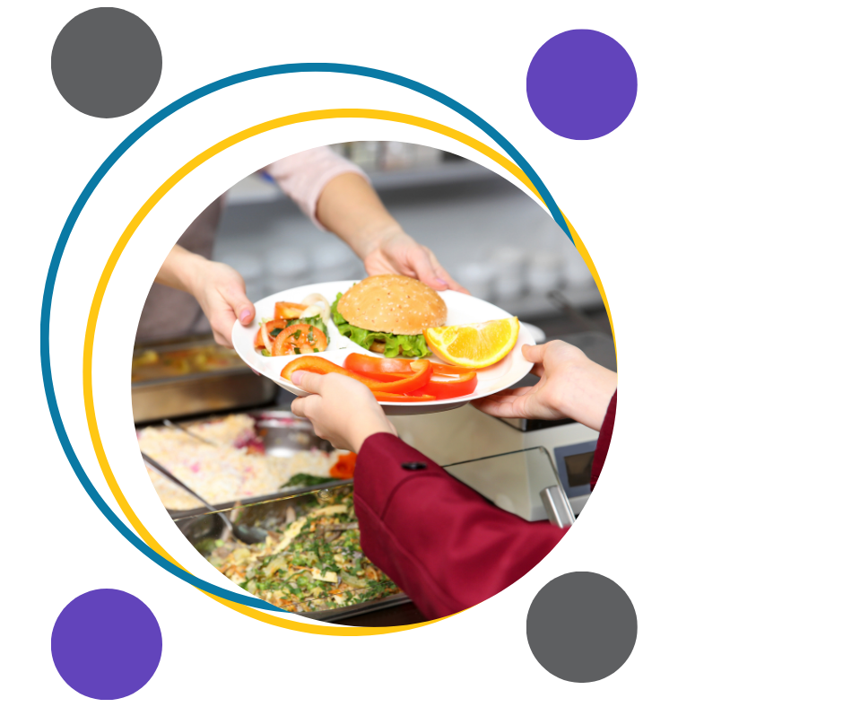 Image shows a plate of food being handed over the counter. The plate containing burger tomatoes orange and sliced peppers
