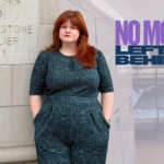 No Mum Left Behind for Mother's Day photo of white woman lenaing gaianst the wall